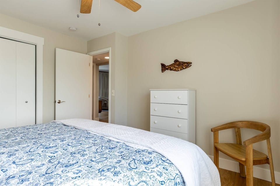 The 2 bedrooms and the sleeper sofa guest all share a full bath in the hall.