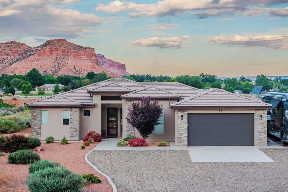 Welcome to Roaming Red Rock, where luxury and location meet views and convenience. Enjoy 3 bedrooms and 2 bathrooms, a fully fenced backyard, a fully appointed kitchen, a firepit, BBQ, and full RV hookups.