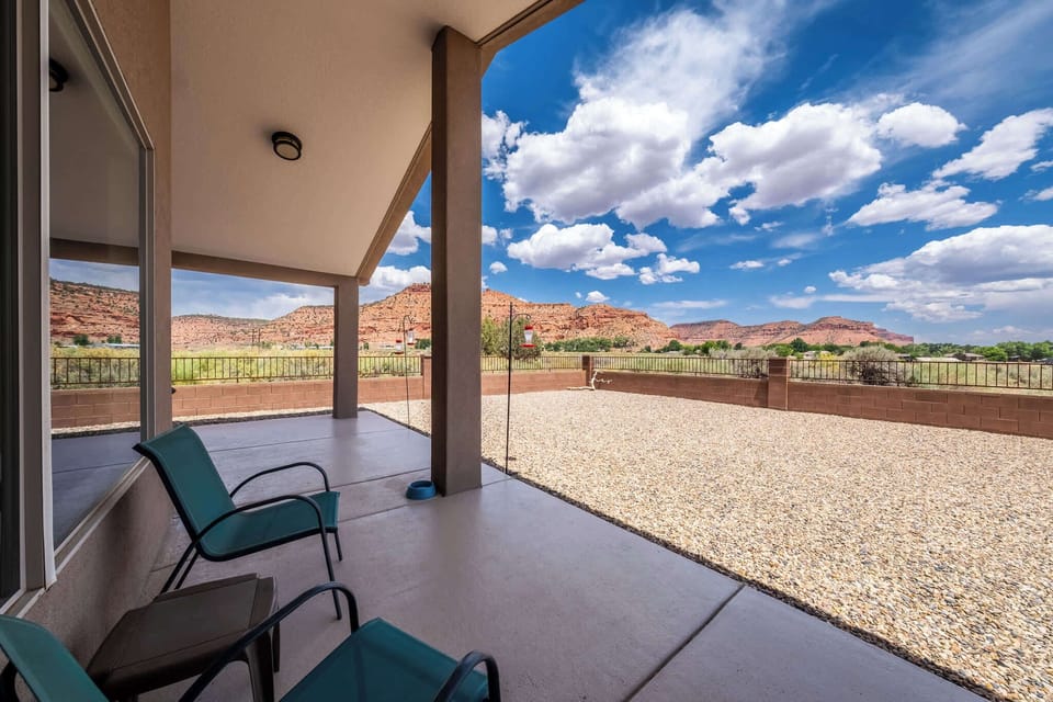 Views Views Views! Enjoy spectacular sunrises and sunsets from your very own back patio. Let the furry 4 legged family members roam in the fully fenced backyard, gather 'round the firepit, enjoy a cup of coffee, and just relax