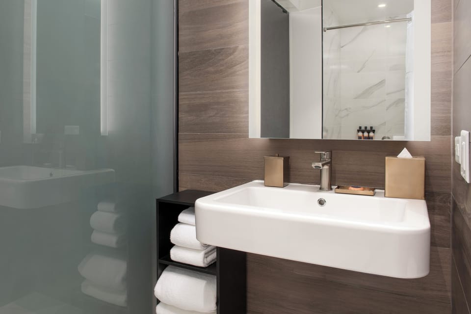 Shower, rainfall showerhead, eco-friendly toiletries, hair dryer