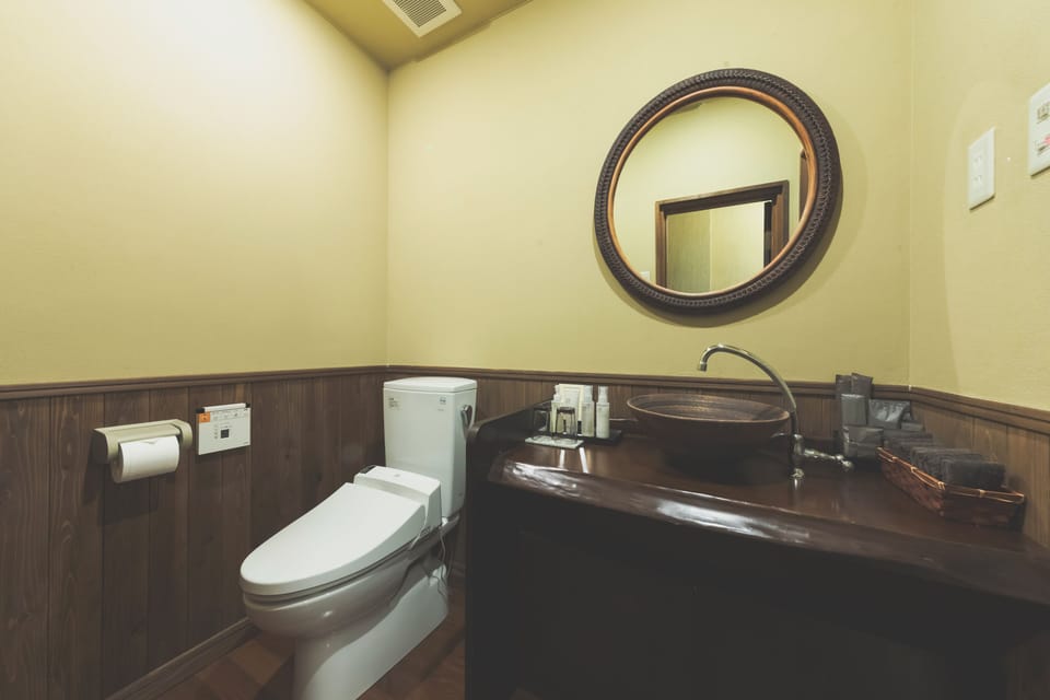 Twin Room, River View | Bathroom | Free toiletries, hair dryer, slippers, bidet