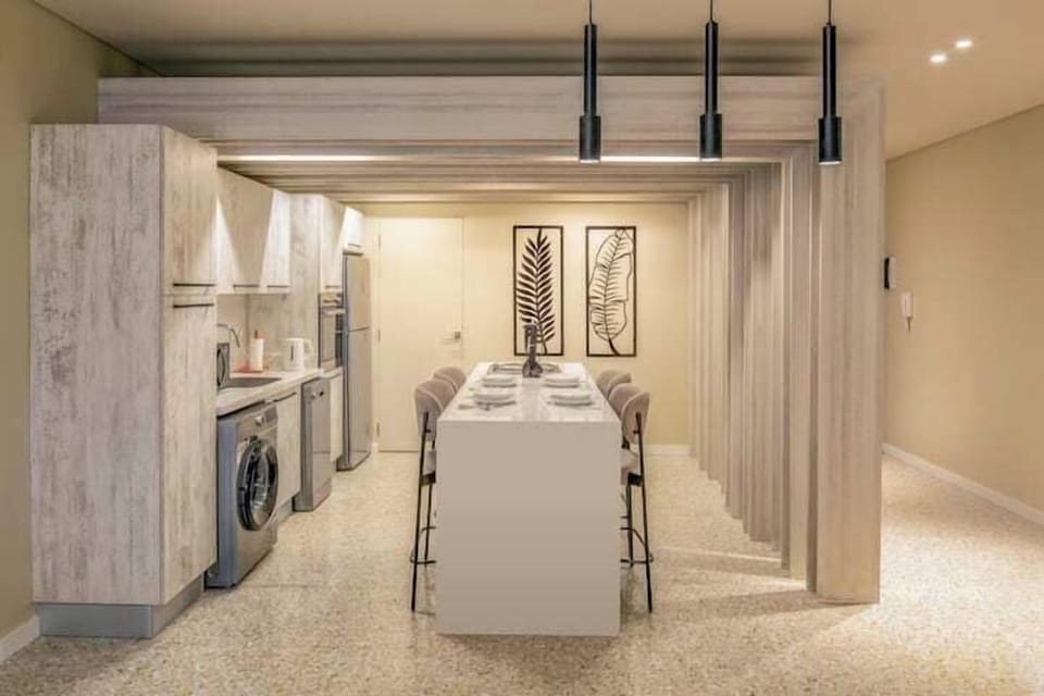 Apartment, Balcony, Garden View | In-room dining