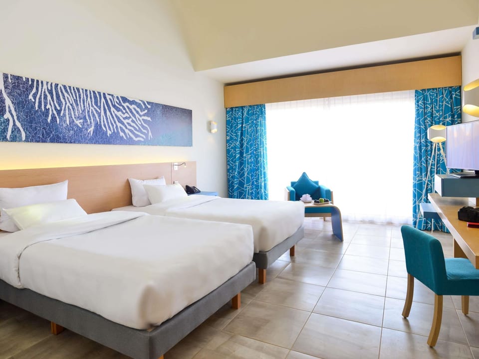 Free minibar items, in-room safe, desk, iron/ironing board