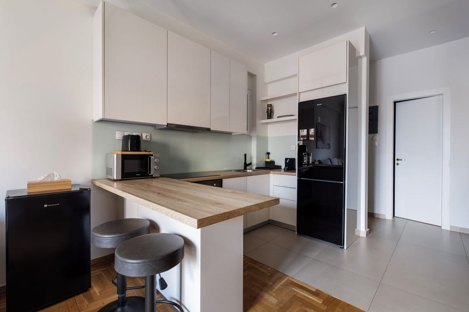 Apartment, 2 Bedrooms, Kitchen, City View | In-room dining