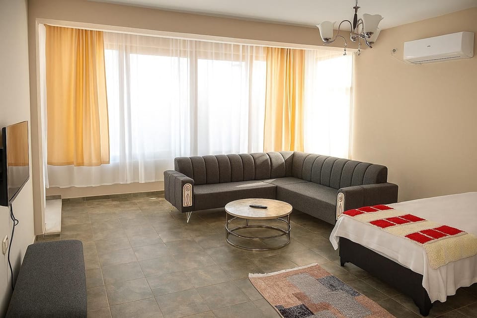 Family Studio, Balcony, Sea View | Living area