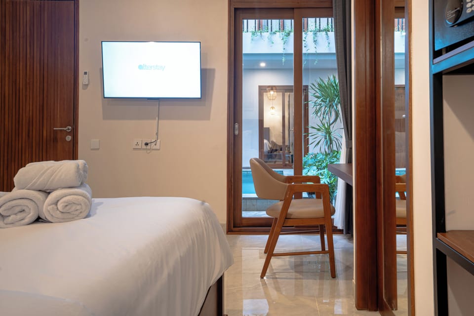 Deluxe Double Room, Pool View | In-room safe, desk, laptop workspace, free WiFi