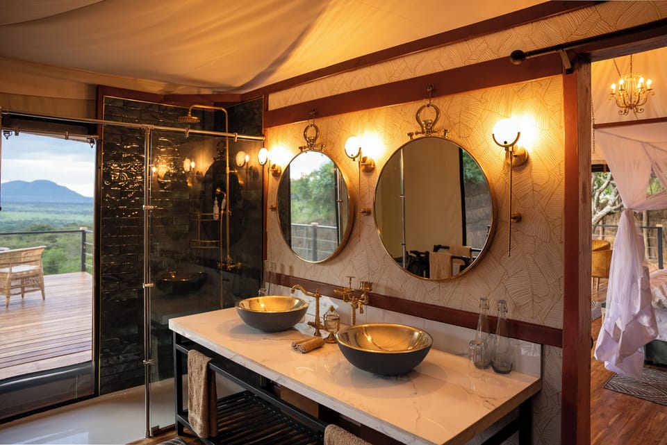 Luxury Tent, 1 Bedroom, Hill View | Bathroom | Hair dryer, towels, soap, shampoo