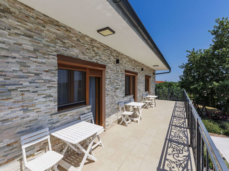 Balcony, Porch, Flagstone, Deck, Outdoor Furniture, Daylighting, Tile, Handrail, Home Door