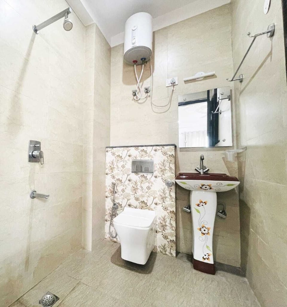 Shower, slippers, towels, soap
