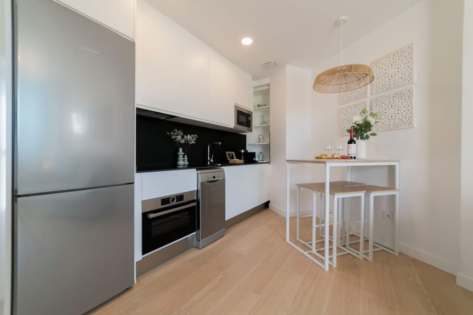 Deluxe Apartment, City View | Private kitchen | Full-size fridge, microwave, oven, stovetop