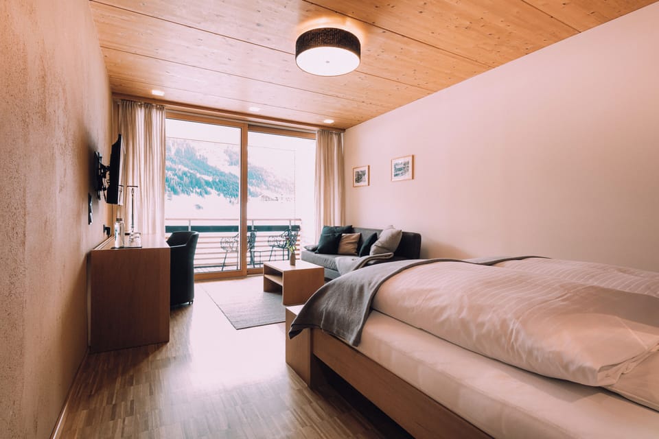 Comfort Quadruple Room, Balcony, Mountain View | Hypo-allergenic bedding, in-room safe, desk, blackout drapes