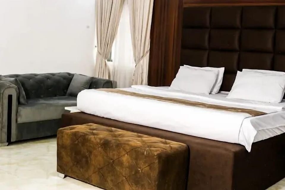 Deluxe Room, Balcony, City View | Desk, laptop workspace, blackout drapes, soundproofing