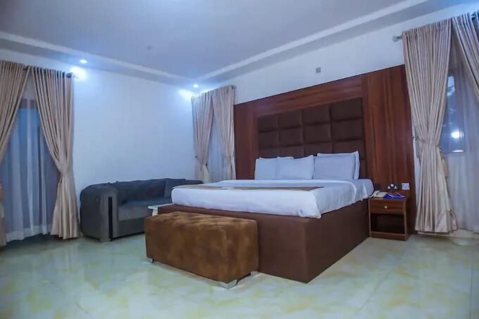 Deluxe Room, Balcony, City View | Desk, laptop workspace, blackout drapes, soundproofing