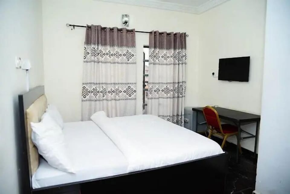 Deluxe Room, Balcony, City View | Desk, laptop workspace, free WiFi