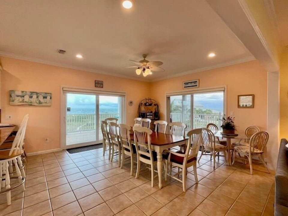 dining area, deck access, water views
