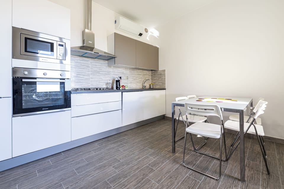 Apartment, 1 Bedroom, Sea View | Private kitchen | Fridge, microwave, oven, stovetop