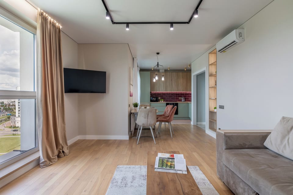Comfort Apartment, Balcony, River View | Living area | 40-inch LCD TV with cable channels