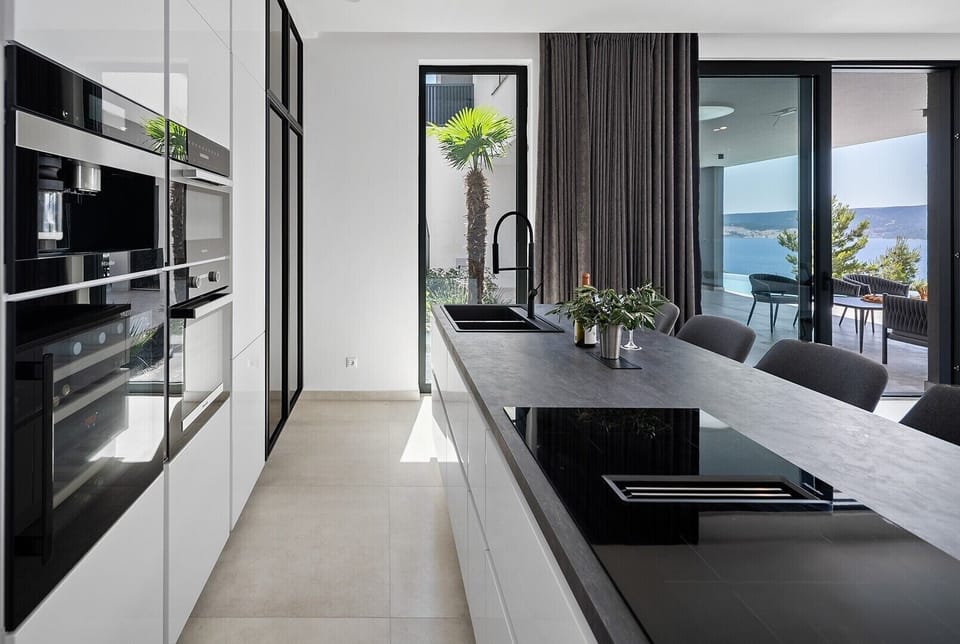 A fully equipped kitchen with all the amenities a modern guest needs 

