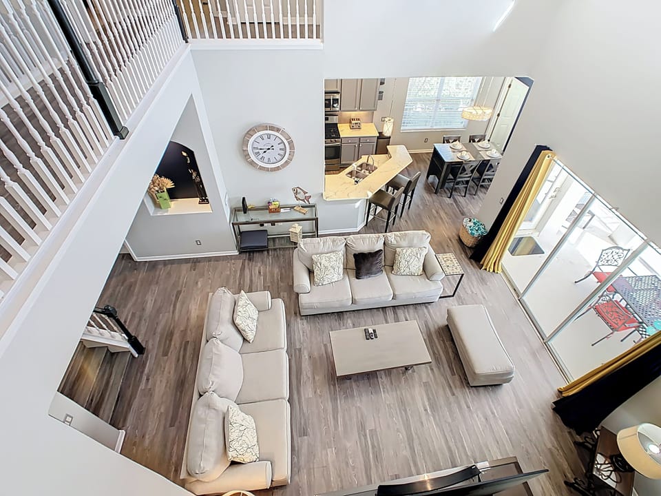 View of living space from the upstairs balcony