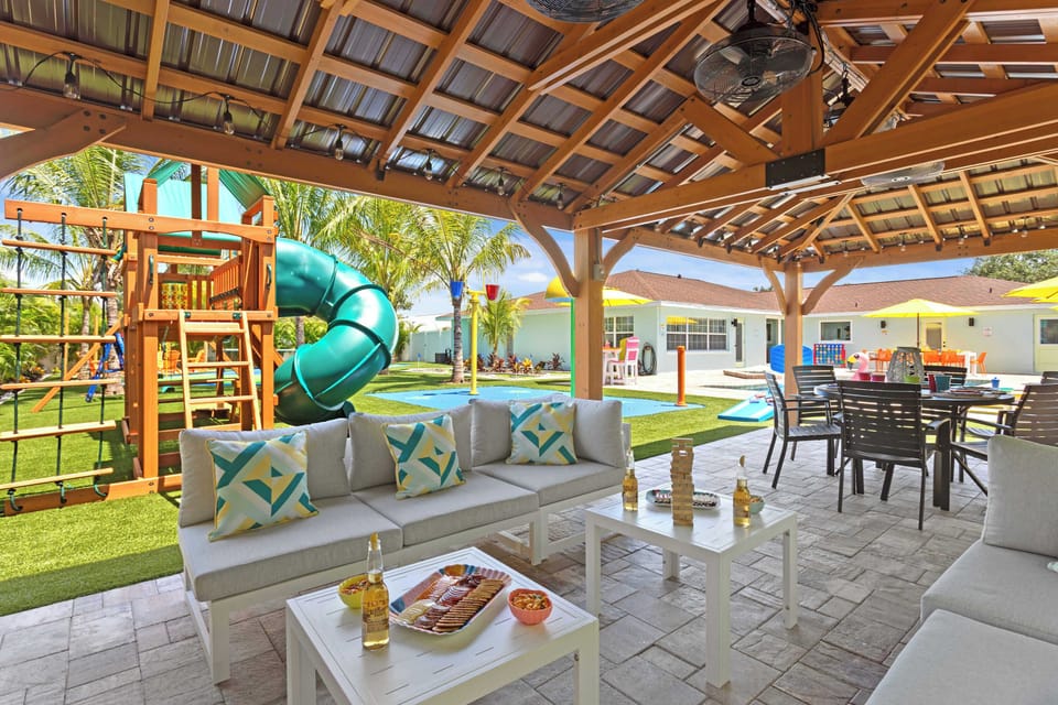 Relax in the gazebo while the kids enjoy the playset with a slide and two climbing walls.