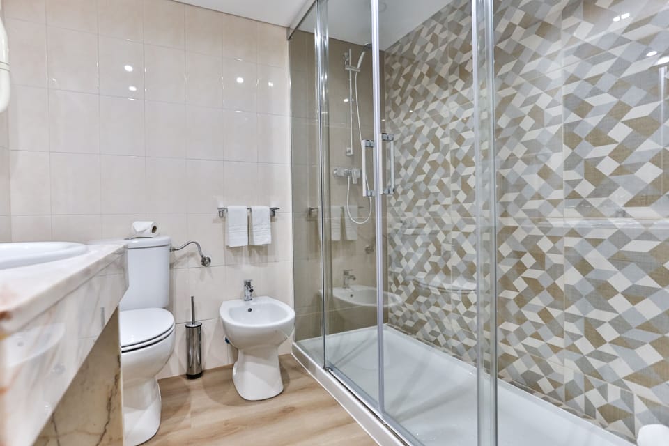 Free toiletries, hair dryer, bidet, towels