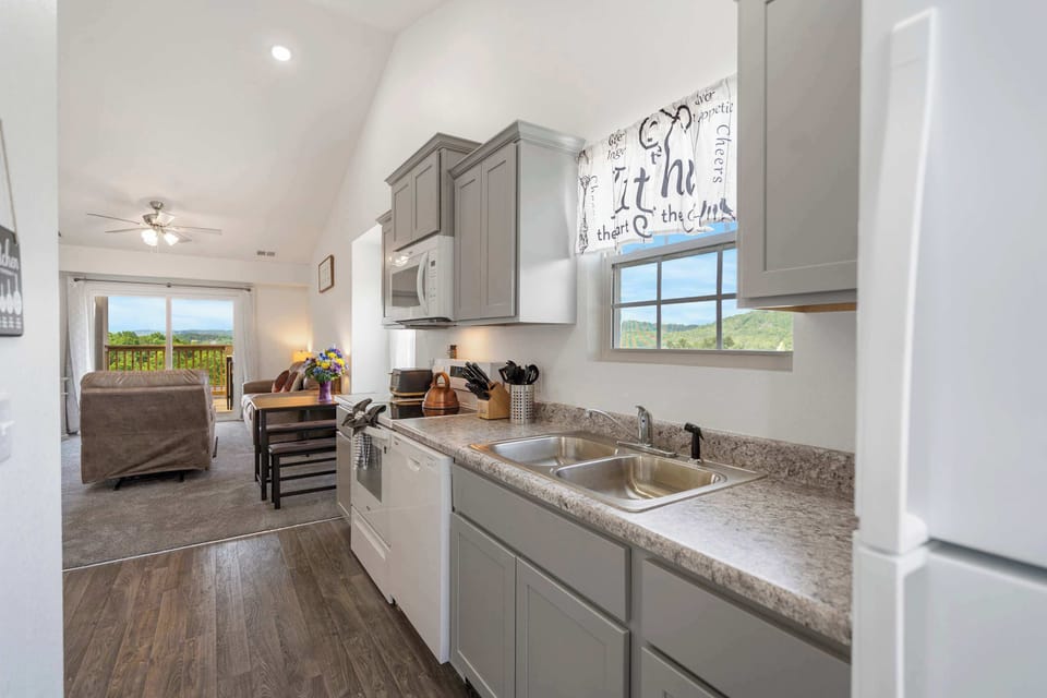 The open, airy kitchen offers ample space & every home comfort​