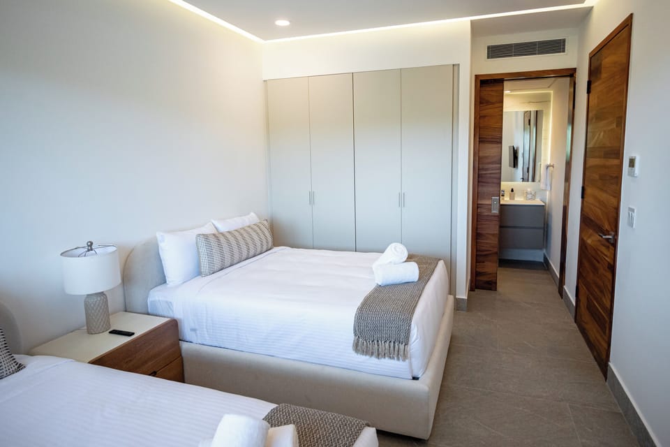 Premium bedding, down comforters, blackout drapes, soundproofing
