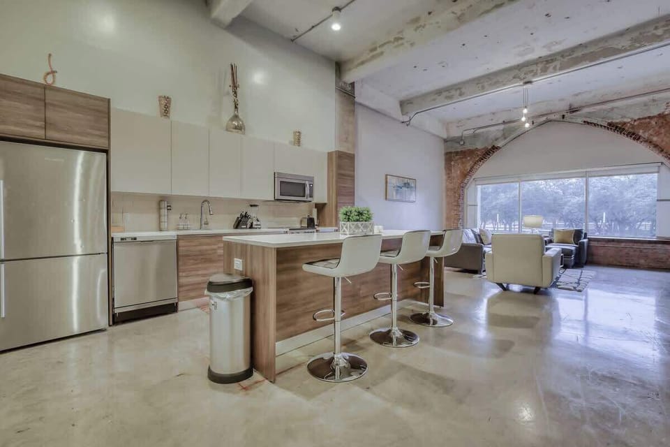 Sleek design meets adventure—whip up meals in this stylish, modern kitchen
