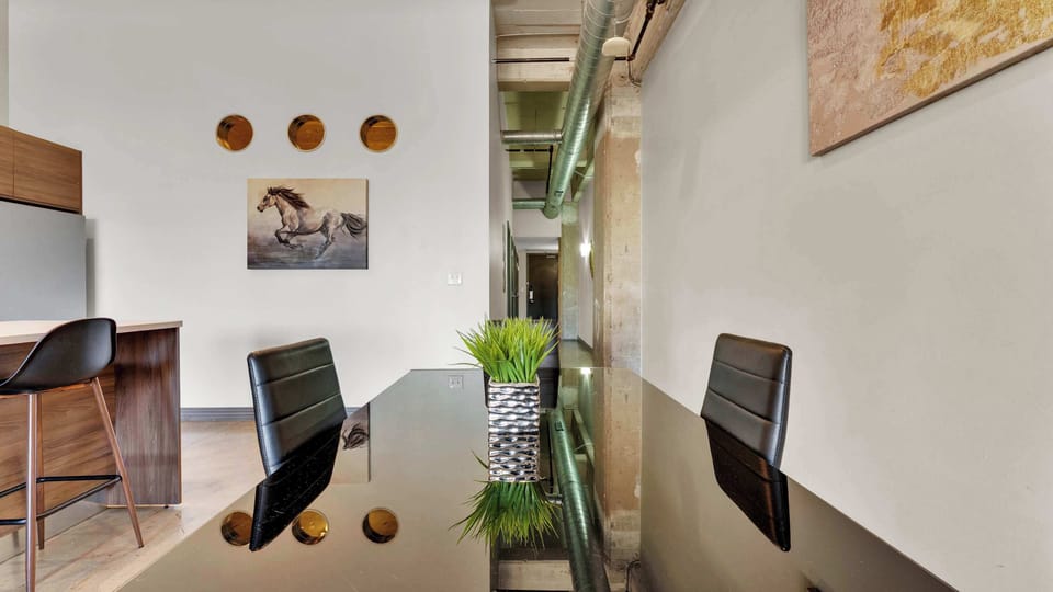 Dining Area: Stylish table for shared meals, adorned with vibrant decor and modern touches!