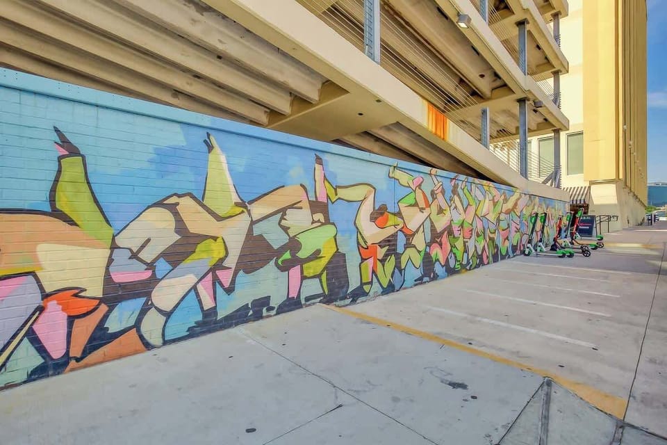 Experience vibrant street art right outside your door in lively Dallas!