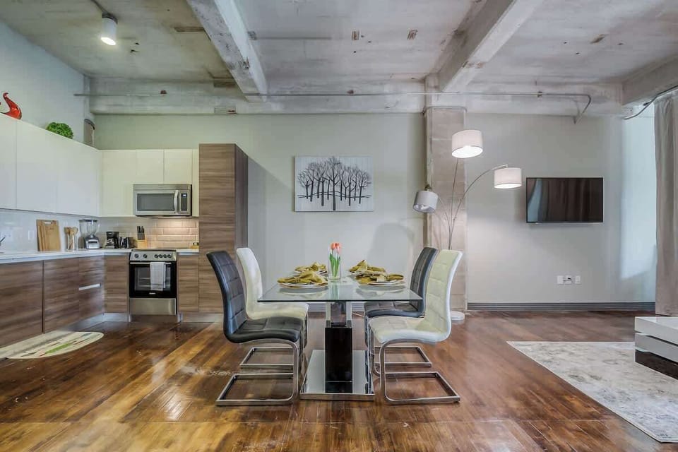 Dine with a view of living and entertainment area