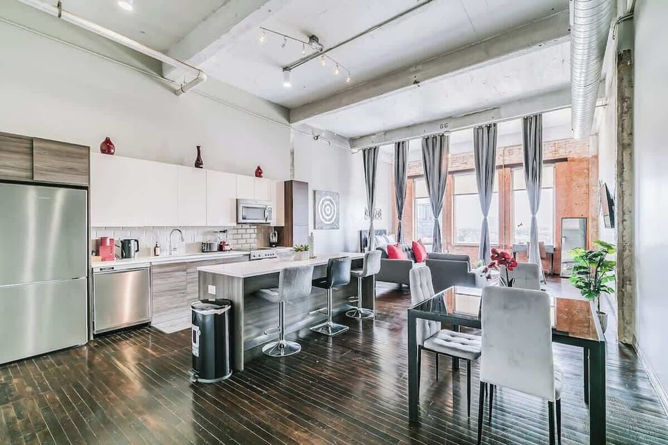 Sleek design, stunning city views, and a chic kitchen for your culinary adventures!