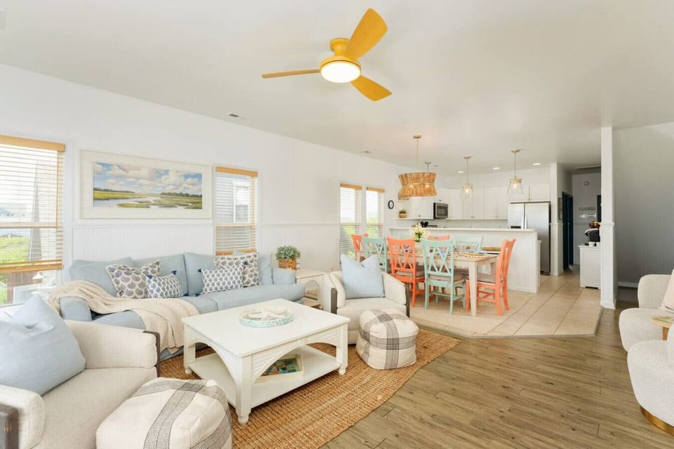 Family-friendly Topsail Beach home with open layout living, dining, and kitchen.