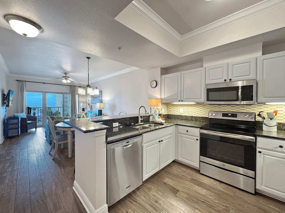 Condo, Multiple Beds, Balcony, Pool View (Sunset Crossing) | Private kitchen | Fridge, microwave, oven, stovetop