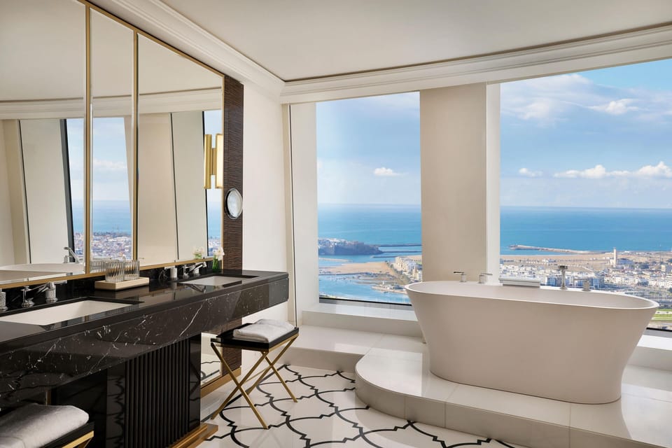 Premium Suite, 1 Bedroom, Bay View | Bathroom | Deep soaking tub, rainfall showerhead, designer toiletries, hair dryer