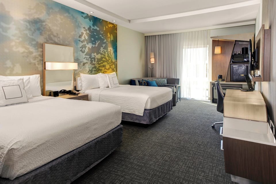 Room, 2 Queen Beds (Two Queen) | In-room safe, desk, laptop workspace, blackout drapes