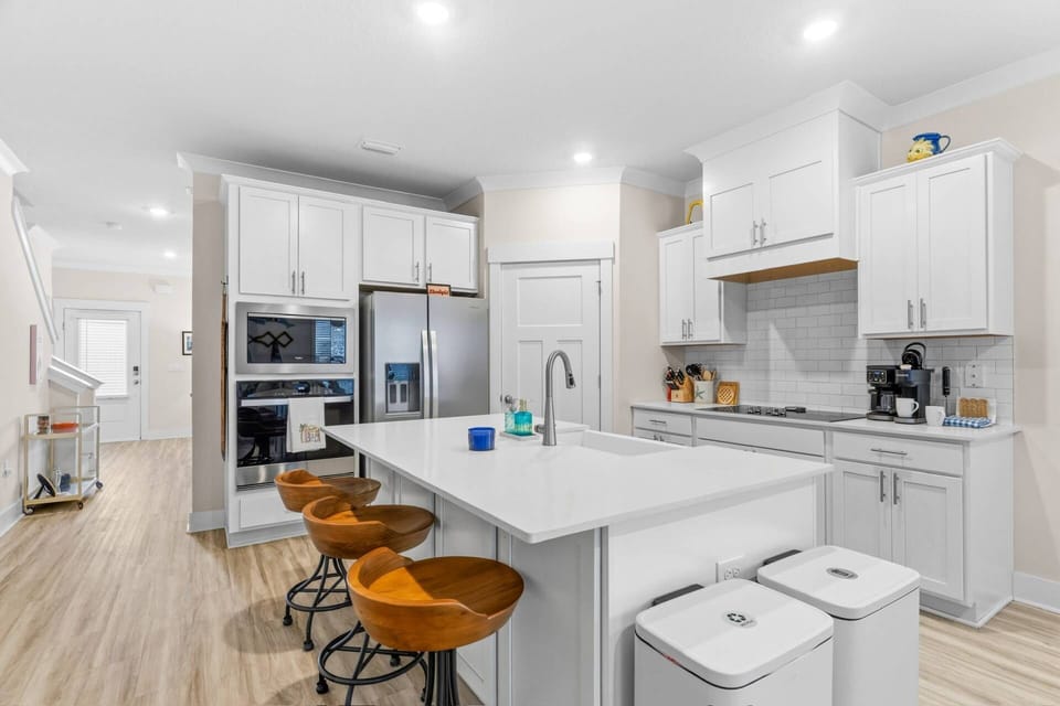 Modern kitchen with large island and walk in pantry