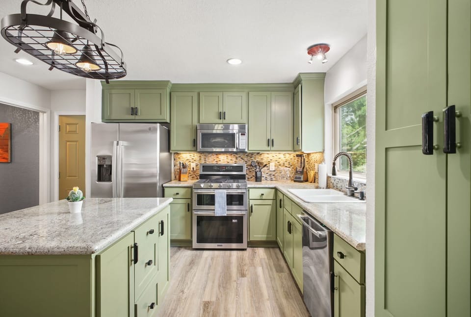 Our fully stocked kitchen features high-end appliances, ample cabinetry, and plenty of cooking space—perfect for preparing meals for the whole crew!