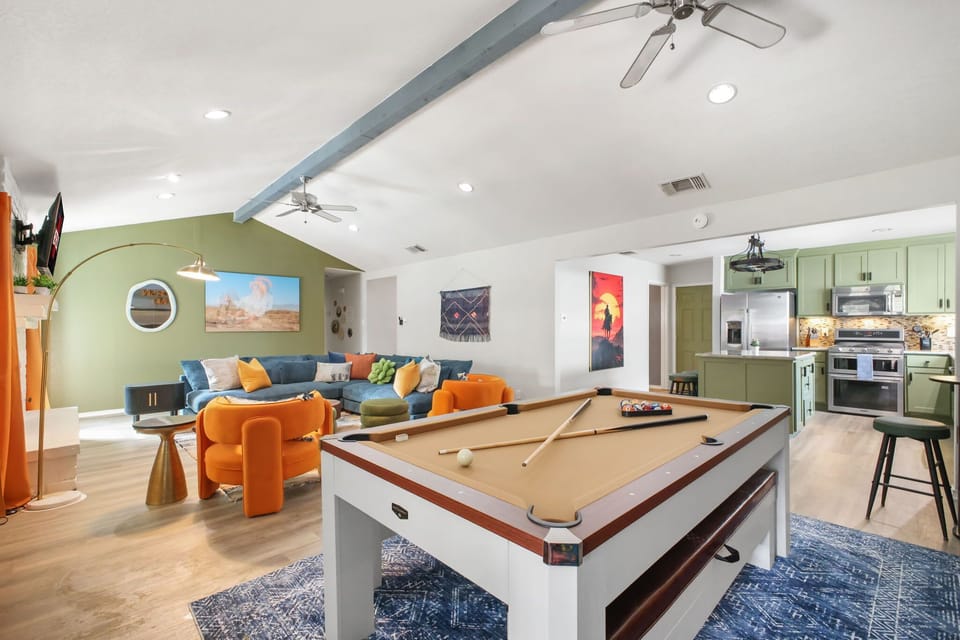 Everything in this home flows seamlessly—with an open-concept layout that connects the living room, dining area, kitchen, and game room. Perfect for keeping everyone together, whether you're cooking, relaxing, or playing!