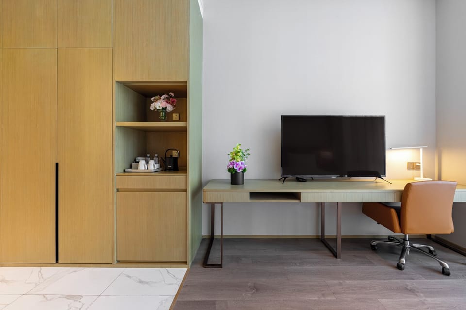 Classic Twin Room | Down comforters, free minibar, in-room safe, blackout drapes