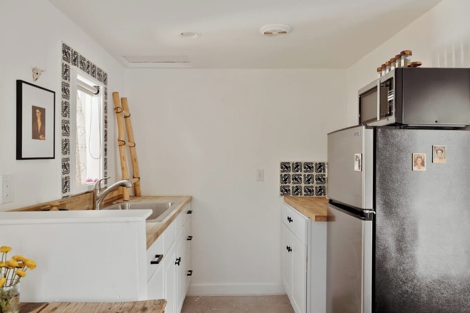 Step into a cozy and stylish kitchen designed for both functionality and charm.