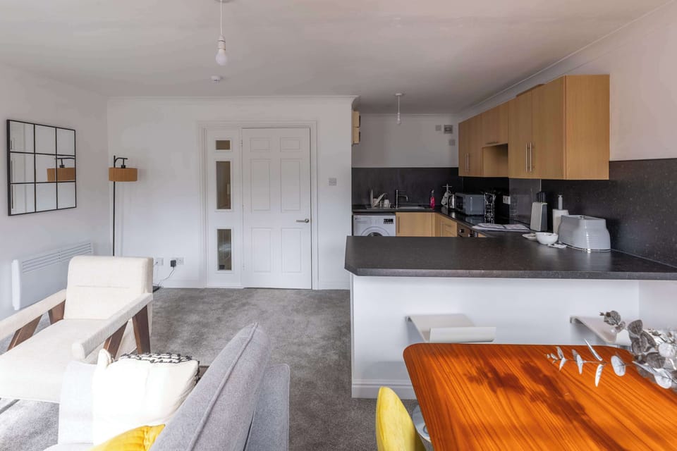 Living Space and Dining Area + Kitchen