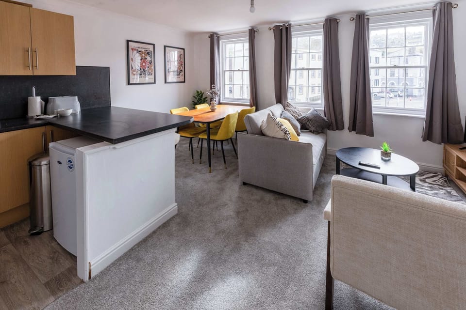 Living Space and Dining Area + Kitchen