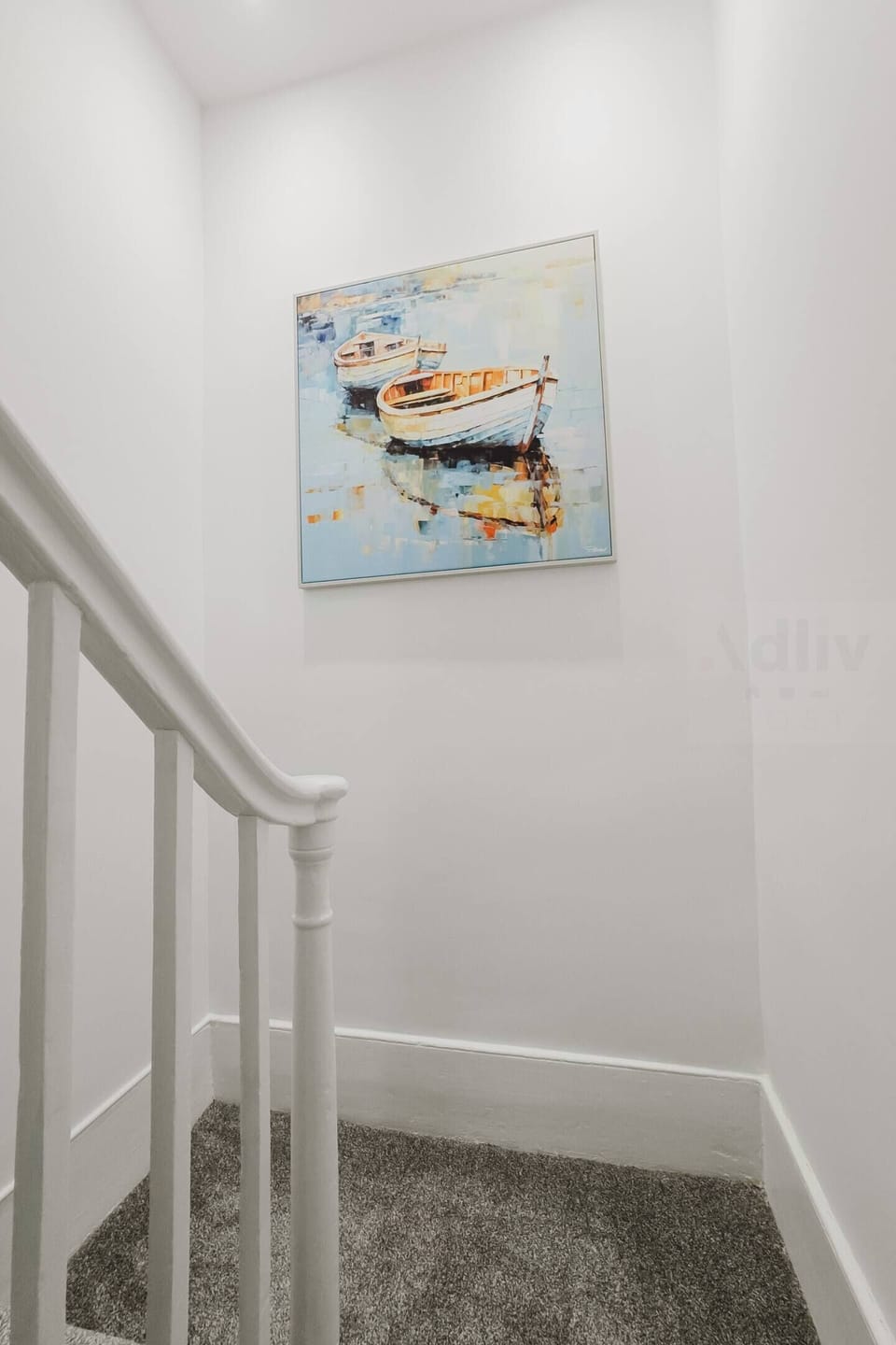 Boutique Stairway
Every detail, from the pristine balustrade to the premium artwork, reflects high-end quality. Begin your holiday ascent into comfort and luxury living. Reserve your stay today!