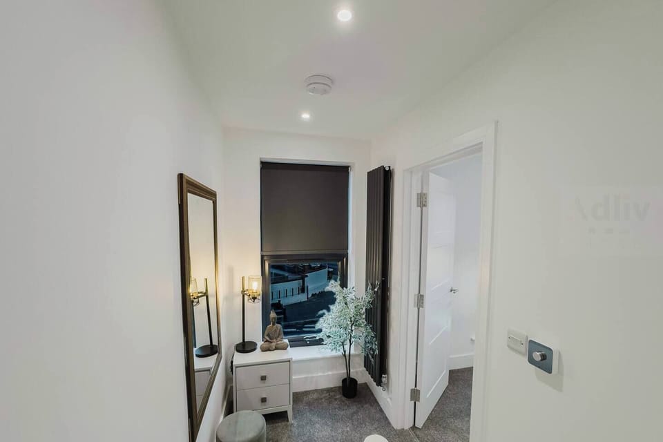 Curated Styling
Even the hallways feature designer touches, ensuring a high-end experience throughout your stay. Enjoy modern radiators and ambient lighting in this luxury rental. Reserve your premium dates.