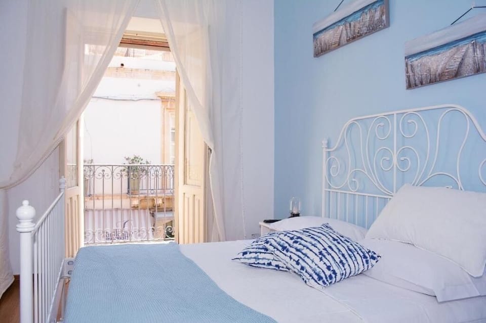 Triple Room, City View | Minibar, desk, laptop workspace, free WiFi