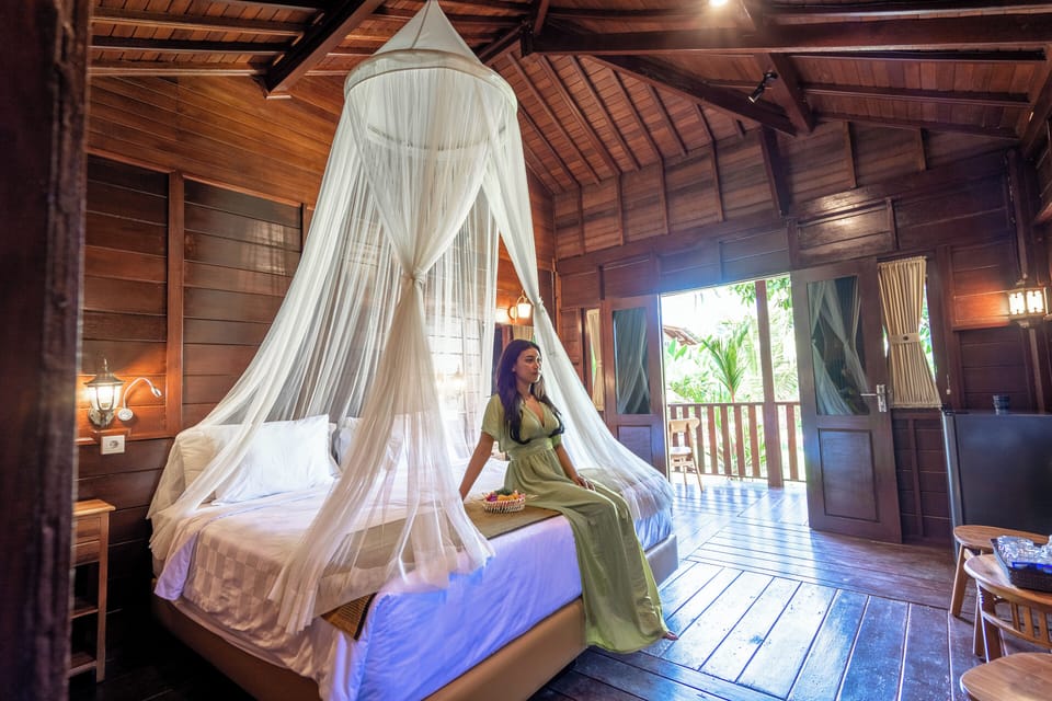 Premier Room, Balcony, Pool View | Desk, laptop workspace, free WiFi, bed sheets