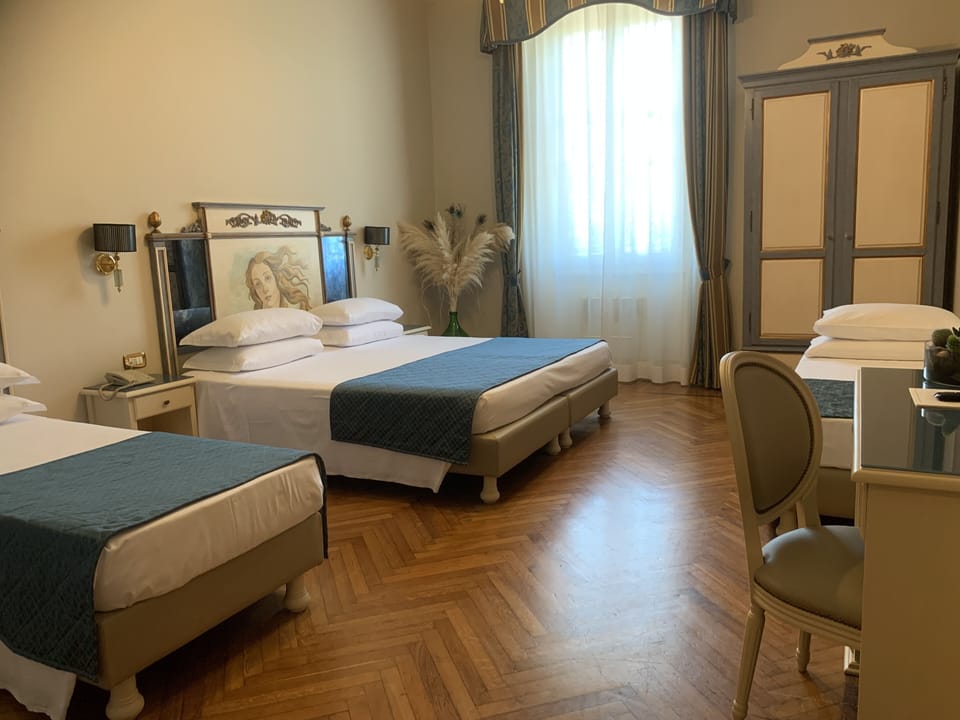 Quadruple Room | Minibar, individually furnished, desk, blackout drapes