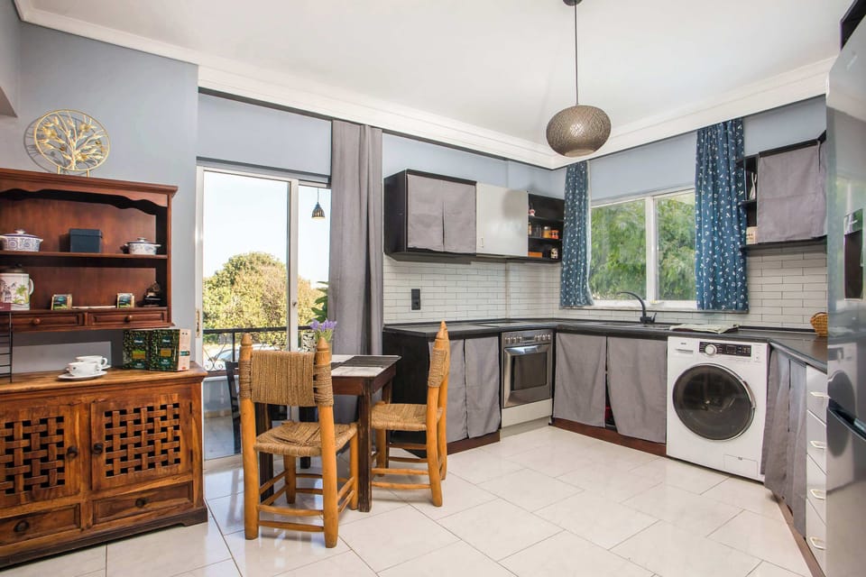 Fully Equipped Kitchen with Garden View
Cook your favorite meals with modern appliances while enjoying serene garden views, everything you need for a comfortable stay.