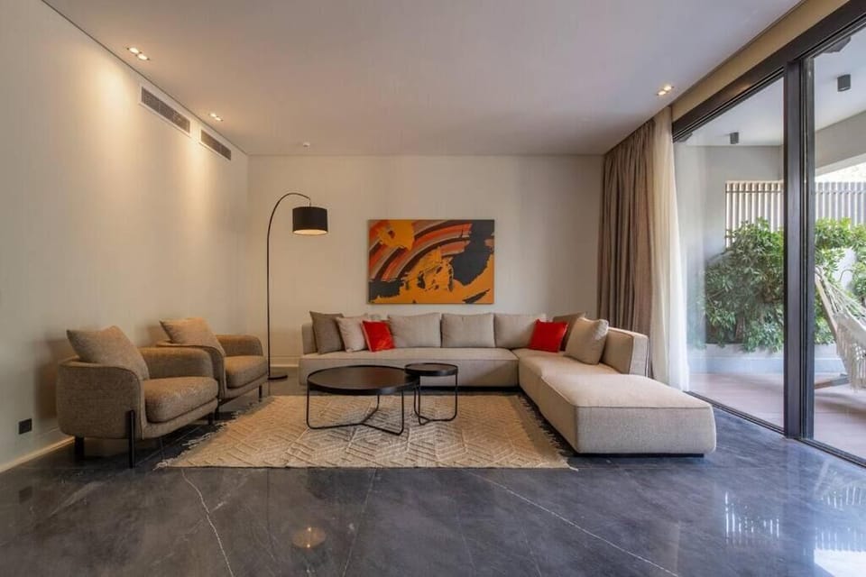 Apartment, Balcony, Garden View | Living area | Flat-screen TV